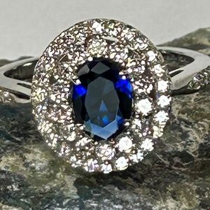Sterling silver lab created blue sapphire with double halo of white sapphires
